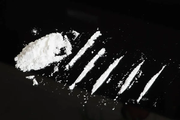 Representação da cocaína em forma de pó (cloridrato de cocaína).